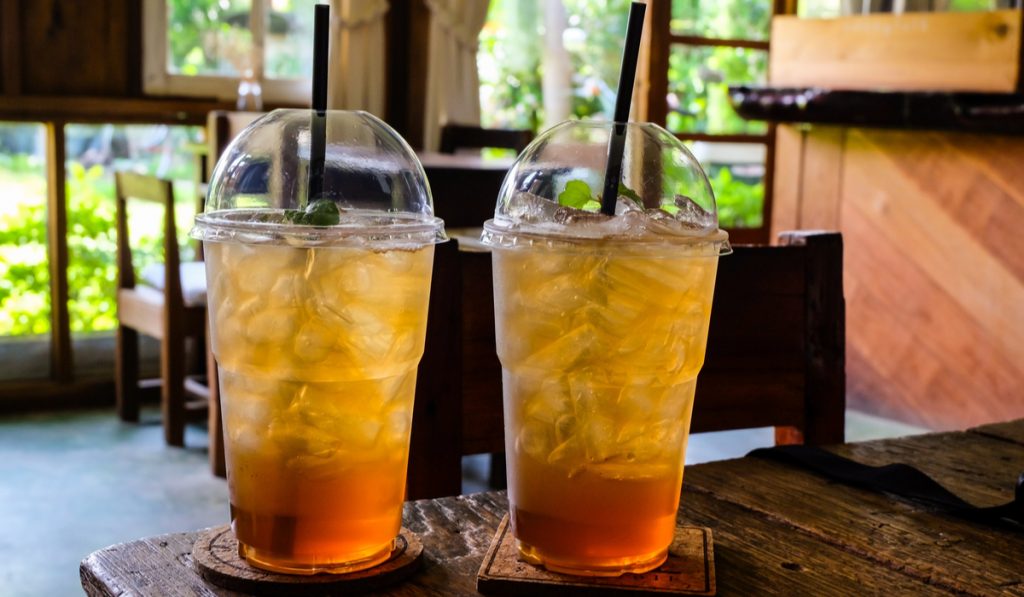 Cold Ice Tea plastic cups black straw 