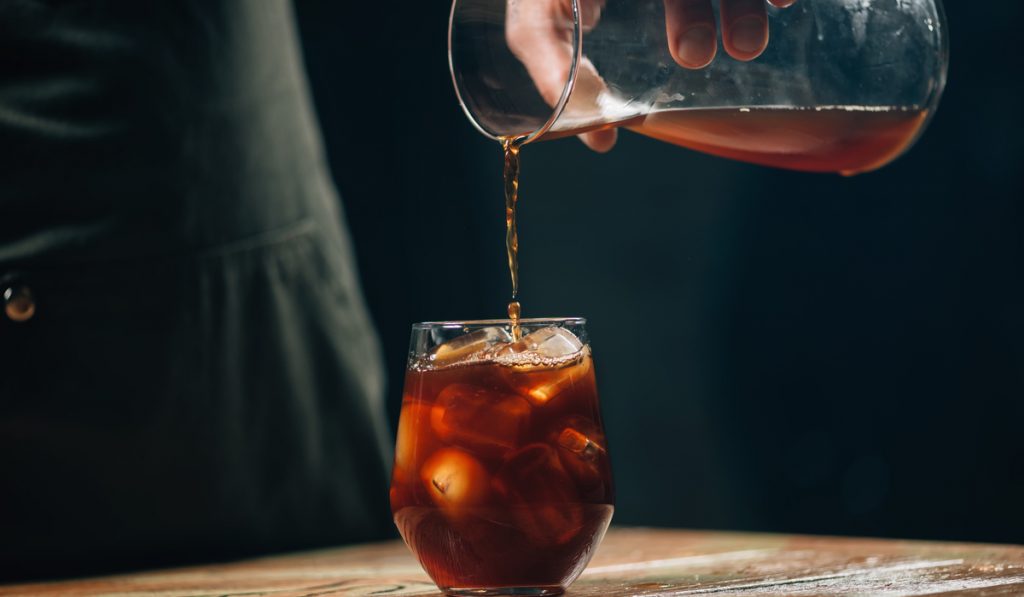 Pouring cold brew coffee