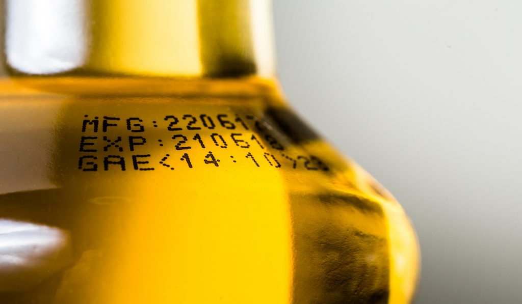 closeup look expiration date on bottle