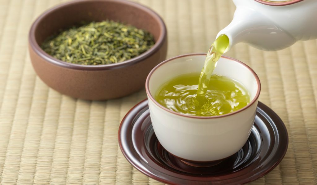 japanese style pouring green tea 